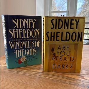 2 novels - Sidney Sheldon: Windmills of the Gods & Are You Afraid of the Dark